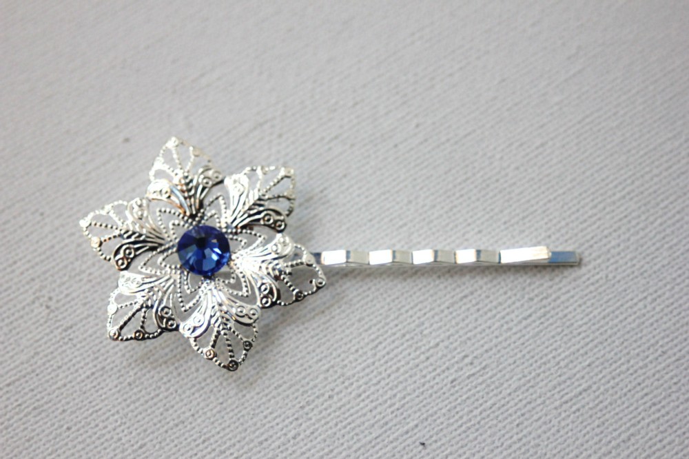 Barrette fleur filigrane étoile et swarovski bleu