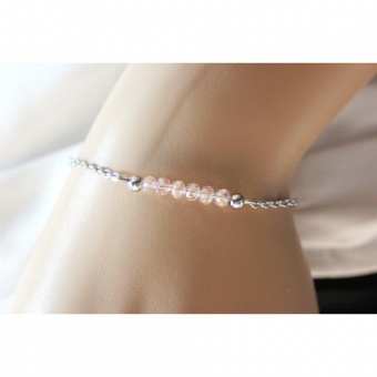 Bracelet en acier et perles facettées rose pastel