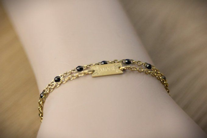 Bracelet multirangs acier doré plaque "Amour" et perles noires
