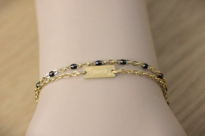 Bracelet multirangs acier doré plaque "Amour" et perles noires