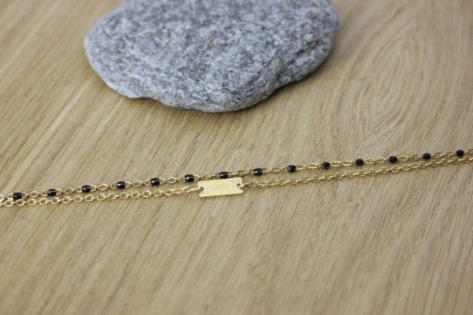 Bracelet multirangs acier doré plaque "Amour" et perles noires