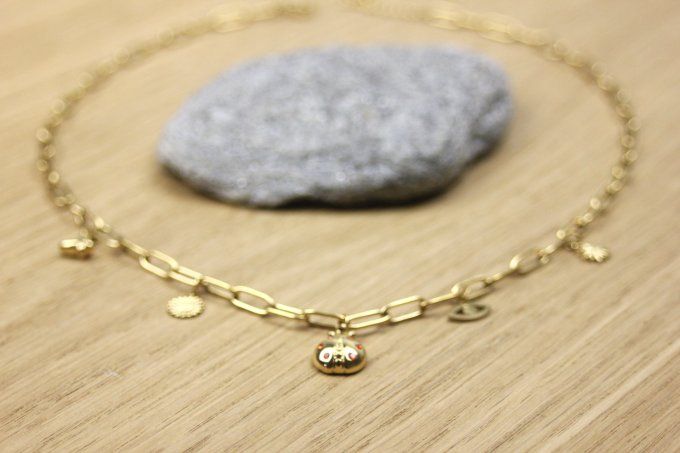 Collier en acier inoxydable doré gros maillons et breloques coccinelle