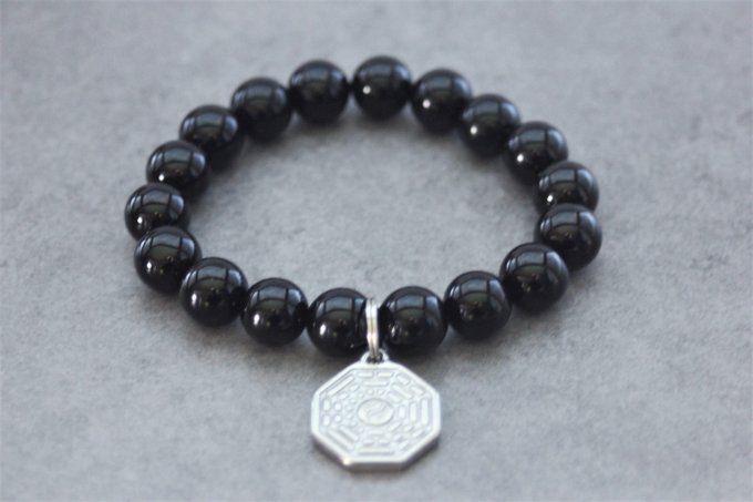 Bracelet perles onyx et breloque yin & yang en acier inoxydable