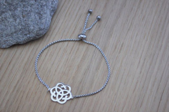 Bracelet acier breloque fleur fermoir perle stoppeur