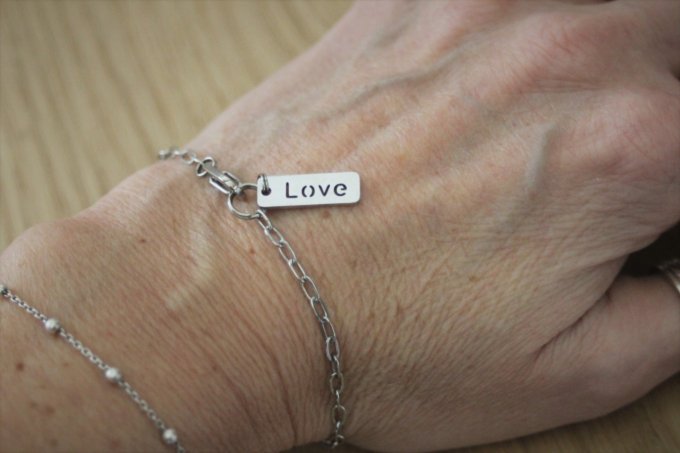 Bracelet acier inoxydable avec plaque message 'love'