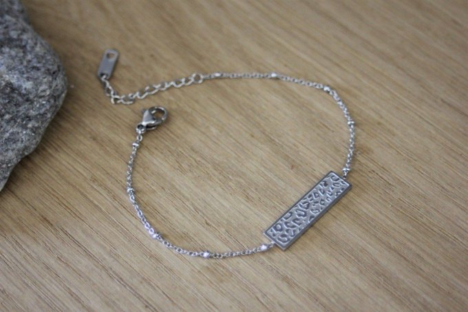 Bracelet acier inoxydable plaque motif léopard au recto, à graver au verso