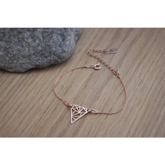 Bracelet or rose triangle graphique