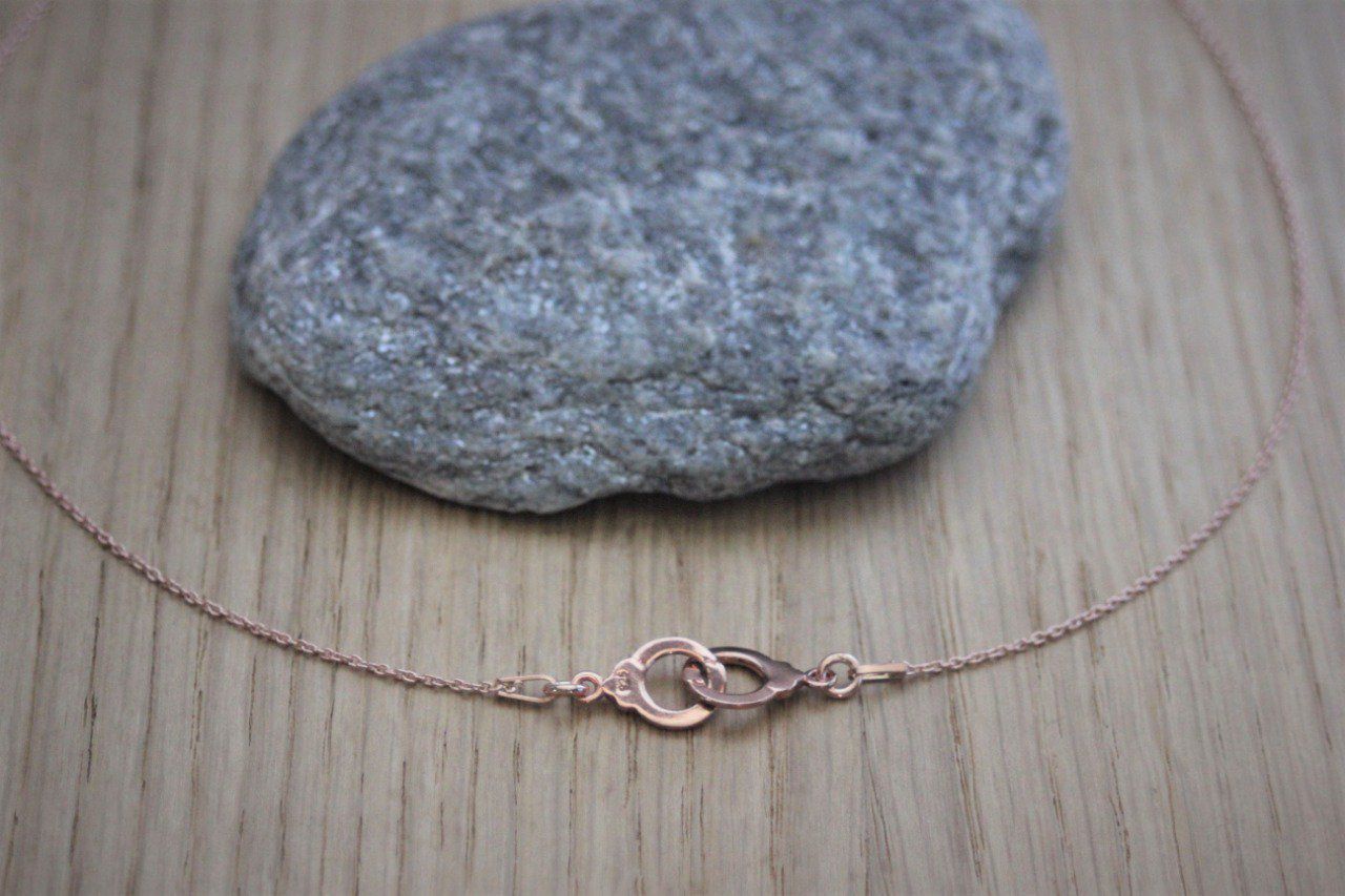 Collier menottes or rose  