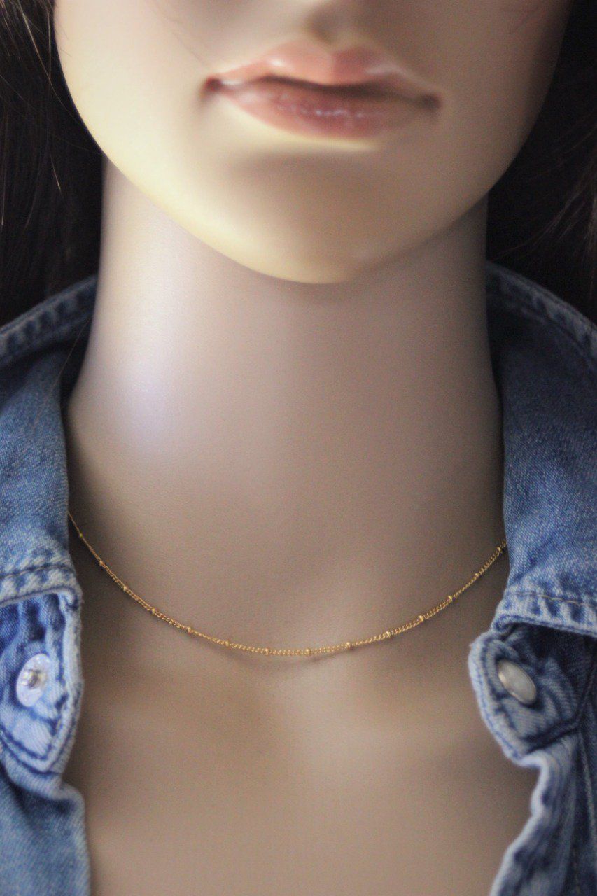 Collier femme DADA ras du cou maille forçat avec 7 pendentifs toupies