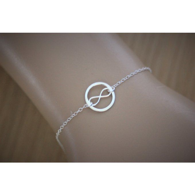 Bracelet Infini et anneau en argent massif