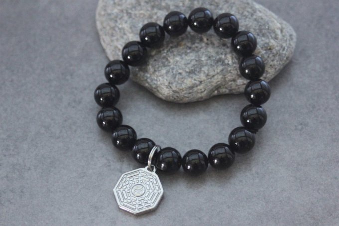 Bracelet perles onyx et breloque yin & yang en acier inoxydable